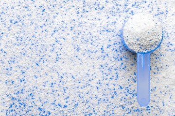 Detergent shirt. Soap white texture with scoop. Liquid powder in cup for washing machine. Laundry...