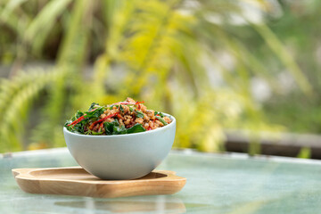 Stir fried minced pork with basil leaves on  thai jasmin rice , thai street food