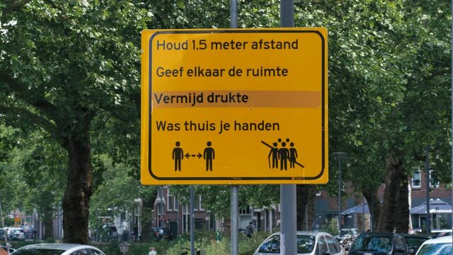 Playbround sign board saying to keep 1.5 meter distance because of Corona virus, Rotterdam, Netherlands.