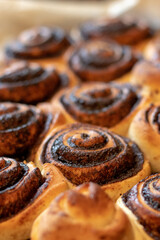 Homemade yeast dough chocolate rolls, close up image shallow depth of field