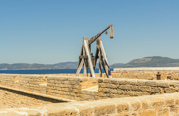 Copy of catapult along the bastions in Alghero (Sardinia, Italy)