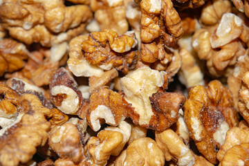 Peeled walnuts close-up. Surface texture. Healthy diet.