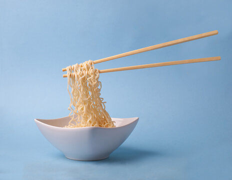 asian traditional dish - noodle ramen with chopsticks