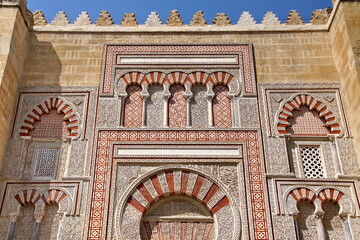 Fototapeta na wymiar Patterns in traditional arabic style on carved walls of the famous Mezquita, Mosque-Cathedral of Cordoba, Spain.