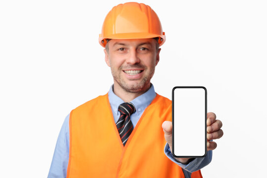 Construction Worker Showing Cellphone Screen On White Studio Background, Mockup