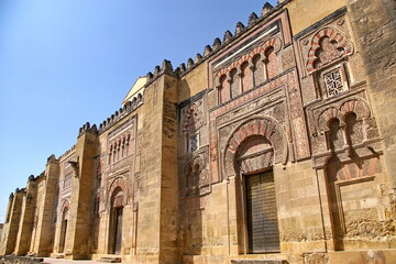 Fototapeta premium View of Mosque-Cathedral of Cordoba, Mezquita-Catedral de Cordoba, also known as the Great Mosque or Mezquita, monuments of Moorish architecture.
