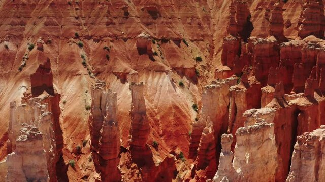 Cinematic aerial of Bryce Canyon National Park, red rocky spires, natural phenomena, landscape of another planet, scenic Utah