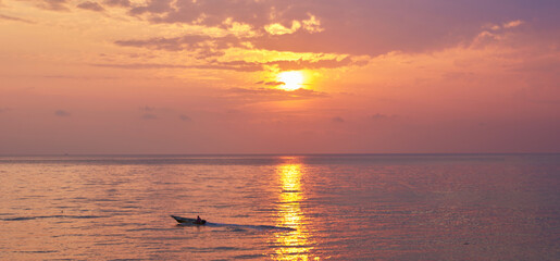 Landscape of paradise tropical island beach, sunrise shot. Beautiful sunrise over the tropical sea....