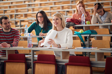 Happy students smiling on lecture