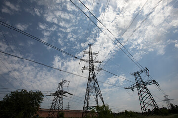 High voltage post. High-voltage tower and blue sky background