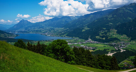 Naklejka premium Hiking in the swiss alps. High alpine route in swiss Alps, canton of Obwalden, Switzerland. Famous tourist routes in Switzerland. Beautiful panoramic view.