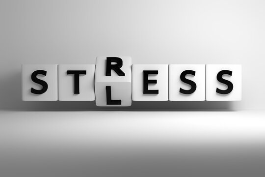 Words Stress Less written in bold large letters on white cubes