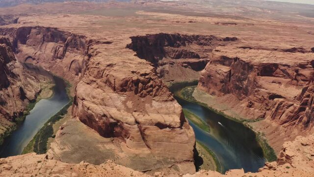 Cinematic aerial of Horseshoe Bend canyon, Colorado river, scenic landscapes of Utah, famous destination