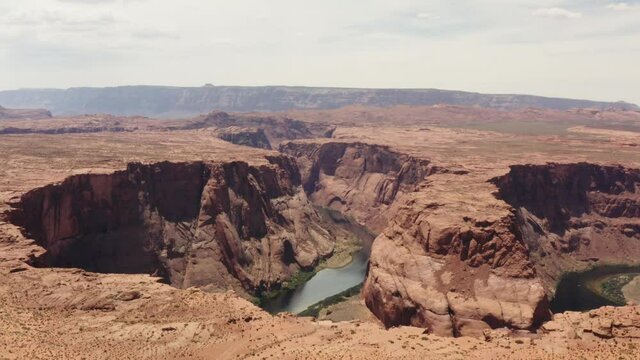 Cinematic aerial of Horseshoe Bend canyon, Colorado river, scenic landscapes of Utah, famous destination