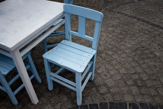 Blue wooden chair in old town of Cunda (Alibey) island