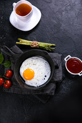 fried eggs in a frying panBreakfast, Fried Eggs! Fried eggs. Breakfast for the rich. The most delicious breakfast with coffee