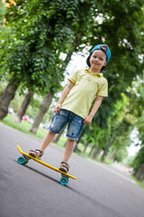 Little boy on skate board.