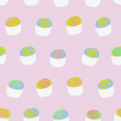 Hand painted seamless pattern with colorful cupcakes on pastel pink background.