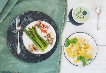 delicious appetizing classic pasta with red pepper, parmesan, asparagus and basil / Pasta mit rotem Pfeffer, Parmesan, Spargel und Basilikum