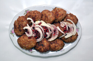 liver cutlets on a light plate. close up . Homemade cutlets on a white plate and white background.