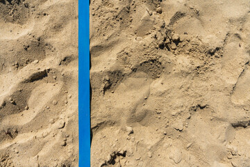 Beachvolleyball Sand mit Begrenzungslinien