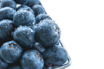 blueberries in a metal grocery basket.Selling berries in the store. The concept of healthy eating.