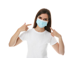Female volunteer in mask on white background. Protective measures during coronavirus quarantine