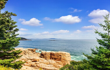 Panoramic view of Bar Harbor with rocky coast  and small islands on a sunny day