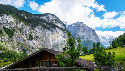 Summer view of alpine valley of Lauterbrunnen. Location place Swiss alp, Bernese Oberland, Europe. Staubbach waterfall is a famous tourist attraction. Nature. Discover the world of beauty.