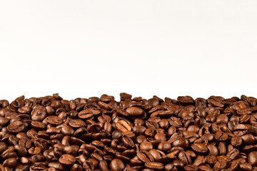 Roasted coffee beans isolated on white background. Border coffee bean decorated with blank copy space for your message.