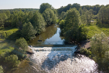Fototapeta na wymiar Waterfall on the Kudma river in the Nizhny Novgorod region