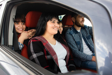 Happy family in the car, travel