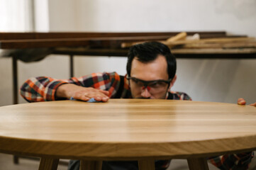Fototapeta premium Working process in the carpentry workshop