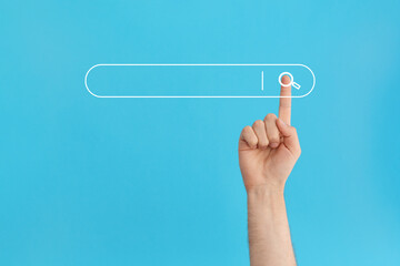 Finger presses the search button in the search bar on a blue background.