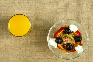 dessert with fruit with whipped cream on the table.