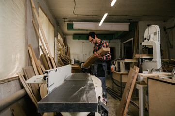 Fototapeta na wymiar Working process in the carpentry workshop