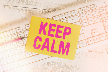 Text sign showing Keep Calm. Business photo showcasing remain composure over situations with fewer...