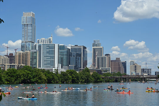 Enjoying the outdoors in downtown Austin, Texas - paddling and having fun on Lady Bird Lake in the middle of the city