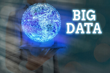 Writing note showing Big Data. Business concept for Dealing with the accessibility of extremely large details with its structure Elements of this image furnished by NASA