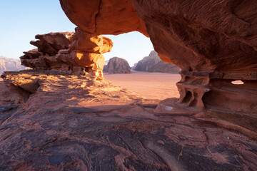 Natural stone bridge in the dry and hot desert of Wadi Rum Jordan similar to Mars