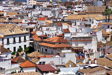 Fototapeta na wymiar Roof of the old city, panoramic aerial view from the bell tower at the Mezquita - Catedral de Cordoba, Andalusia, Spain