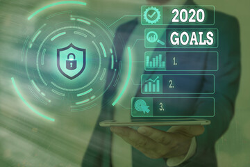 Handwriting text 2020 Goals. Conceptual photo a targeted list of ambitions that need to be...