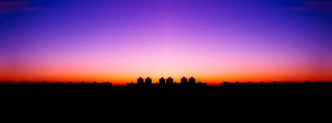 colorful sunset against the backdrop of the city landscape