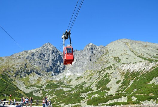 TATRANSKA LOMNICA, SLOVAKIA - August 26, 2016: Red cable car going to Lomnicky stit peak. It is one of the steepest cable cars in Europe