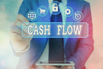 Writing note showing Cash Flow. Business concept for auditing the net amount of cash transferred...