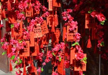 SHANGHAI, CHINA - MAY 7 2017: Chinese red wishes tablets at Tianzifang touristic arts and crafts...