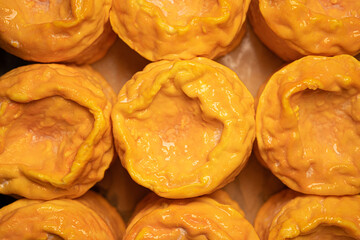 Soft cheese Langres, French cow milk. Creamy and crumbly orange colored, French cheeses collection