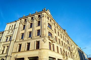 Facades with balconies of historic tenement houses in the city of Poznan..