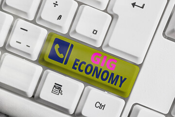 Word writing text Gig Economy. Business photo showcasing a market system distinguished by shortterm...