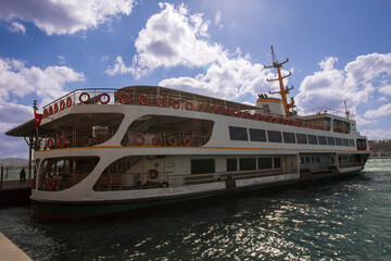 Ferry is parking at the terminal in Eminonu coast of Istanbul city. 
